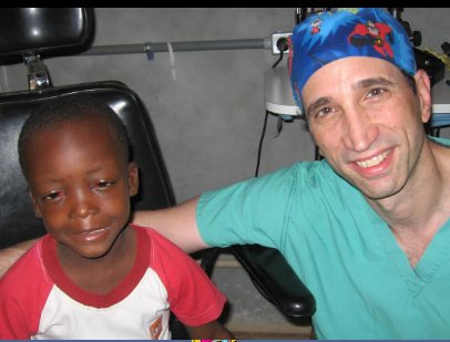 Haiti - Dr. Blatt with pediatric patient